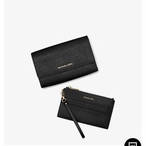 Theee in one Michael kros handbag